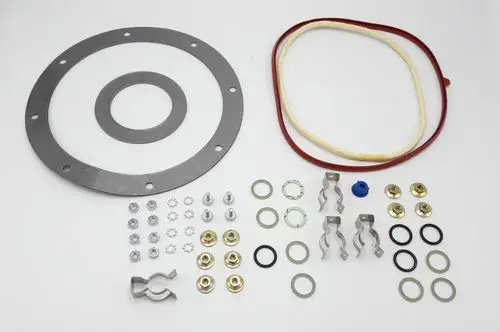Dichtungsset bestehend aus verschiedenen Dichtungen, Ringen, Schrauben und Halterungen, geeignet für Motoranwendungen, bereitgestellt von Remeha.